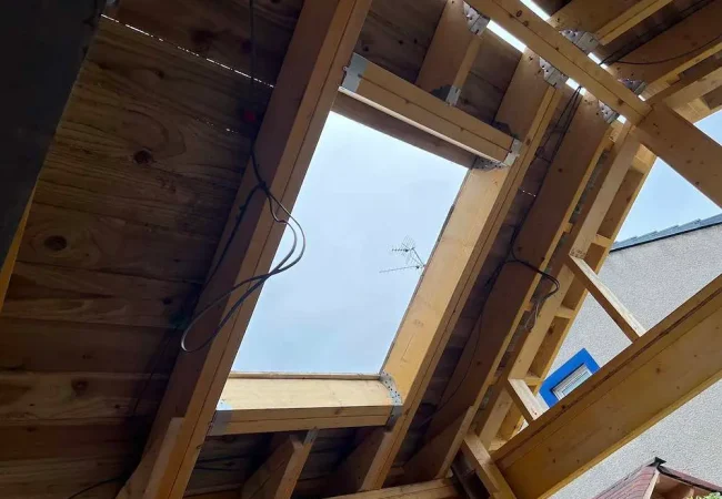 Roof structure with a rooflight opening, viewed from inside